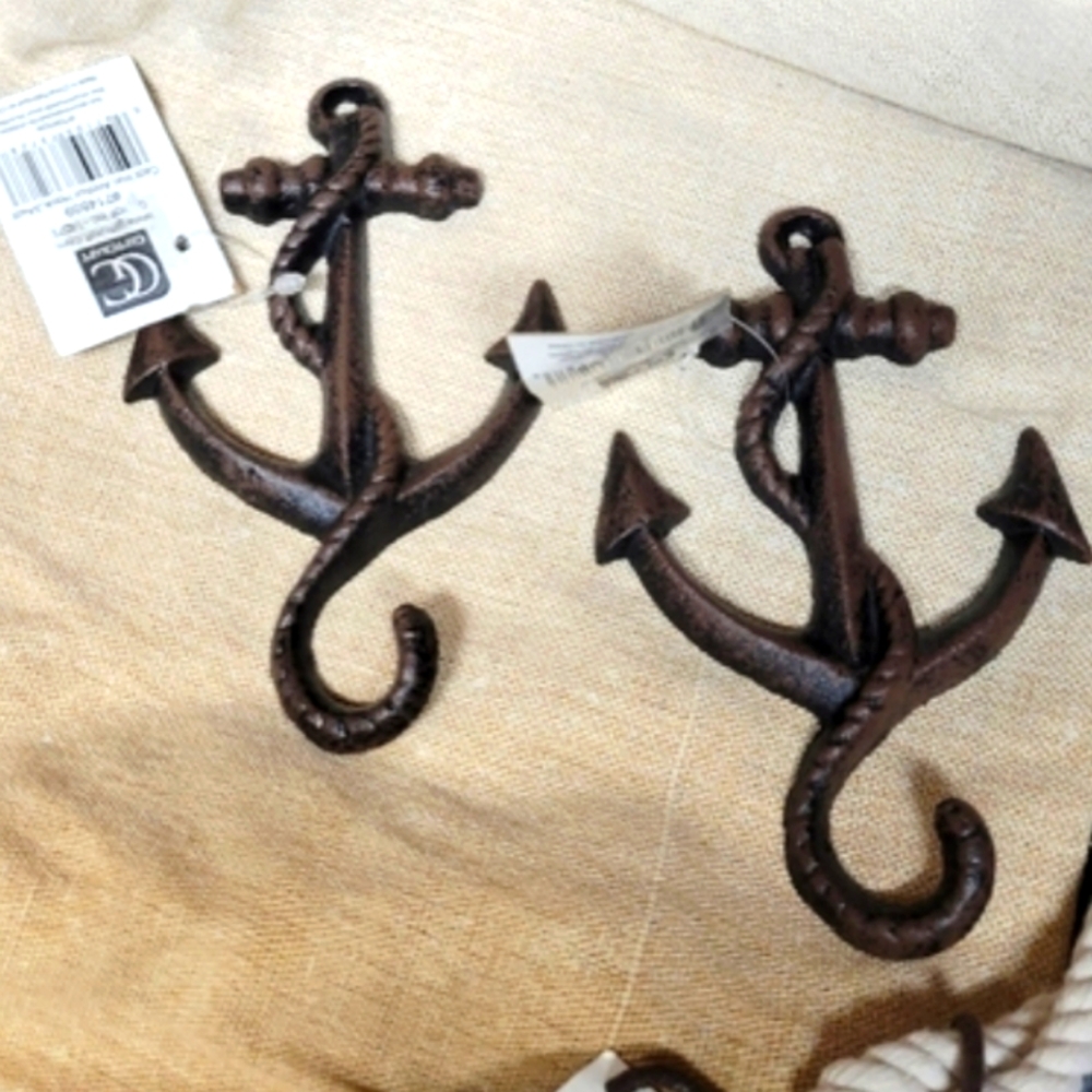 Set of 2 new heavy metal wall hooks approximately 4 in long